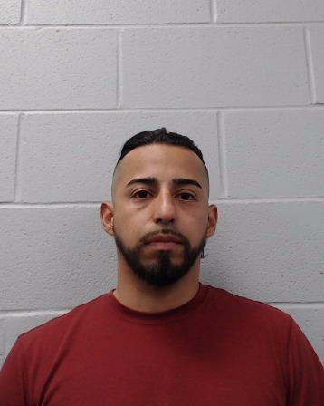 Figueroa Amaya, Rudis booking photo