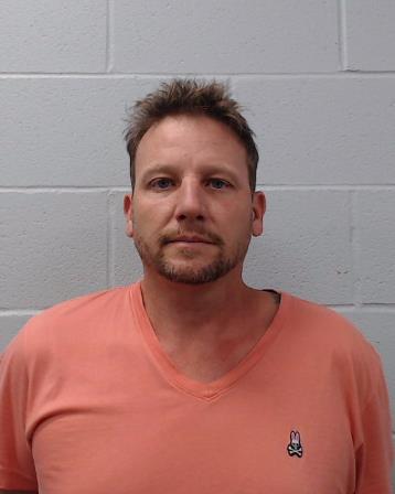 Staff, Christopher Wayne booking photo
