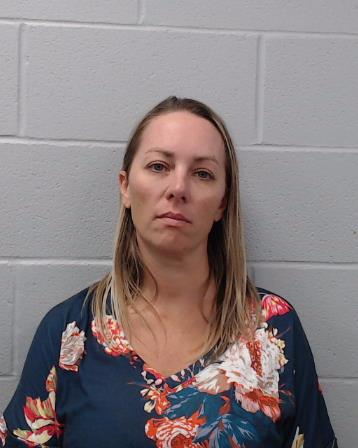 Taylor Opela, Melanie booking photo