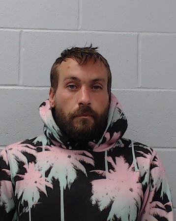 Travis, John Leigh arrested by Hays County SO/PD