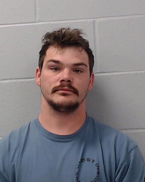 Free, Justin Brady Thach booking photo