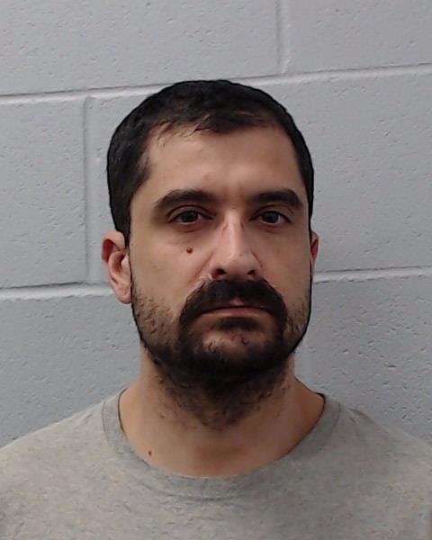 Oktaba, Matthew booking photo