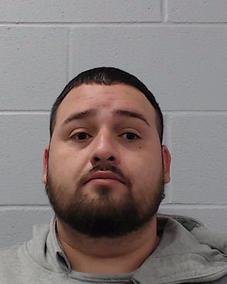 Rodriguez, German booking photo