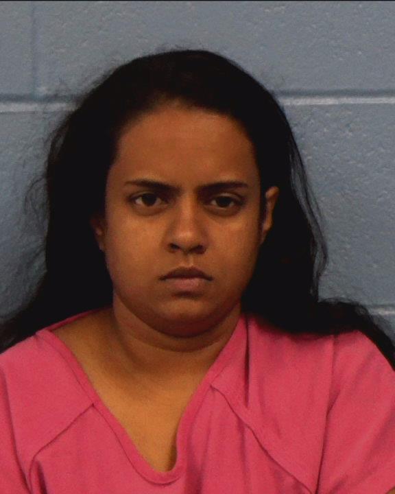 Sajan, Susan booking photo