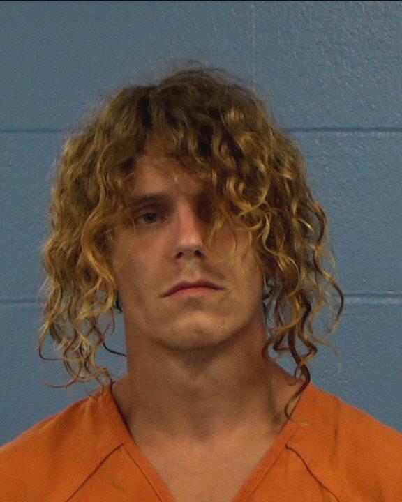 Maki, Keeton booking photo