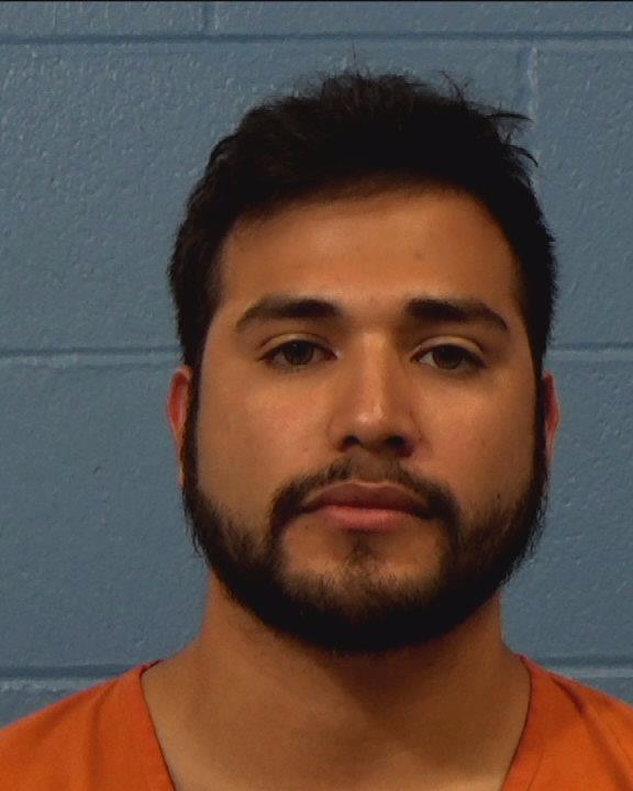 Roger, Rodriguez booking photo