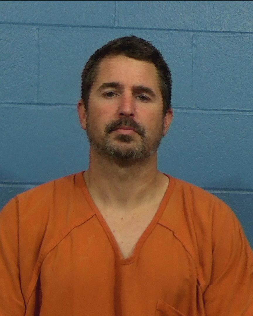 Saxon, Christopher Lee booking photo