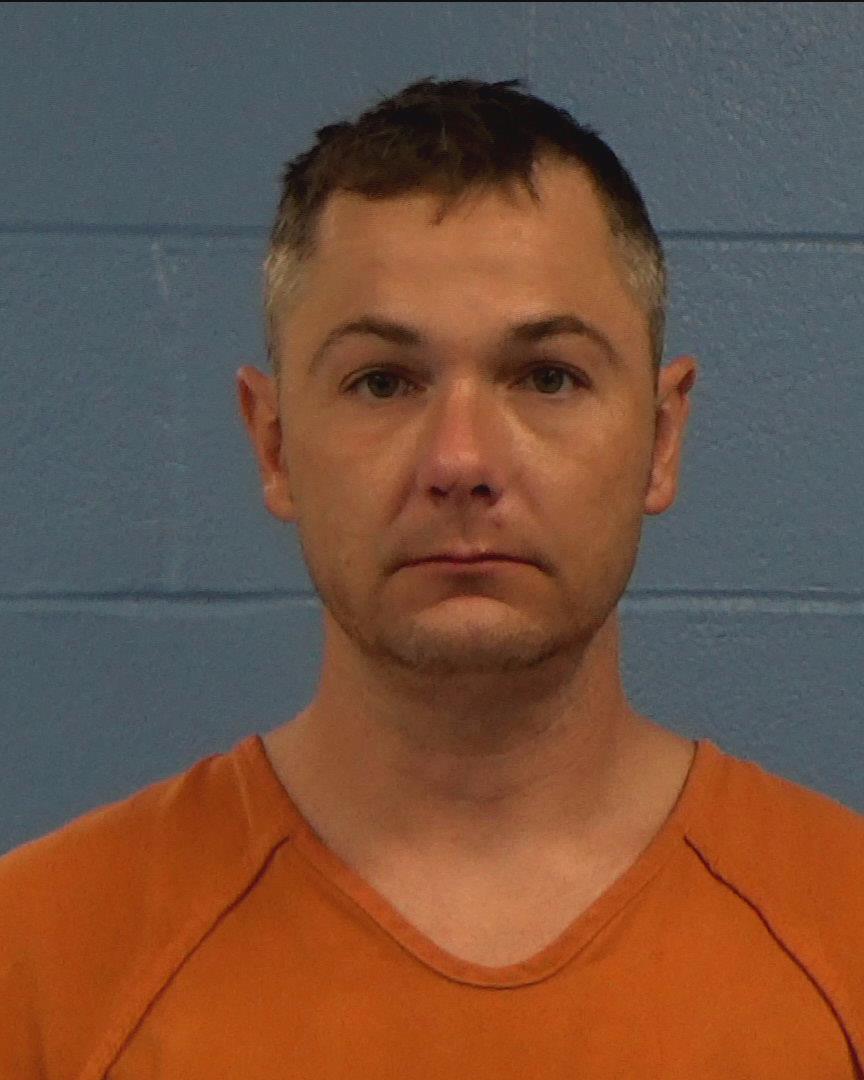 Watkins, Andrew Ladd booking photo