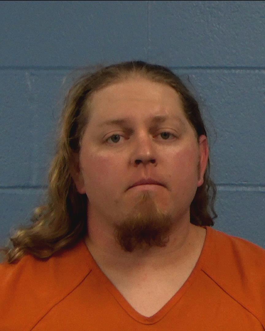 Fluke, Tyger Paul booking photo