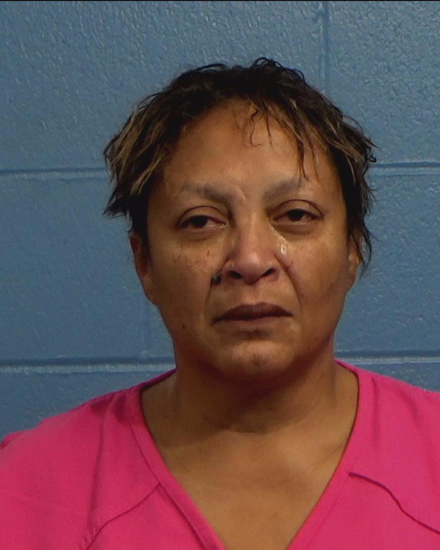 Gregory, Kim Nezzelle booking photo