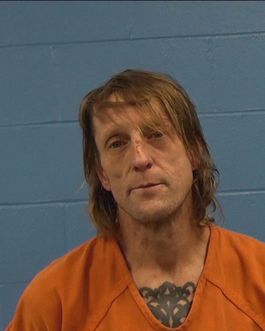 Mally, Travis Benton booking photo