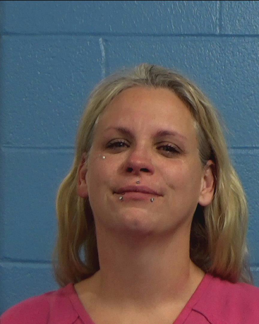 Lance, Amy Parrack booking photo