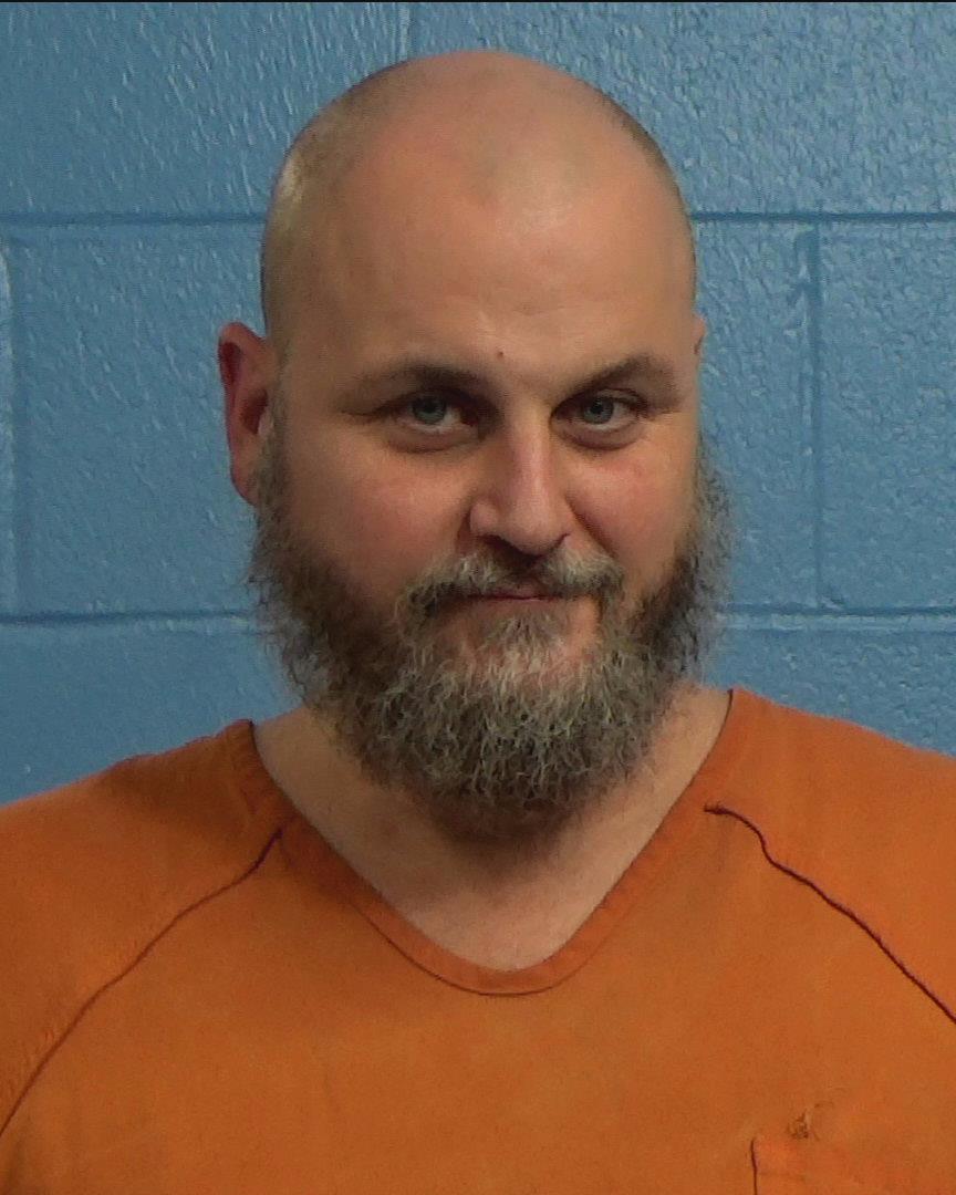 Mills, Travis Herson booking photo