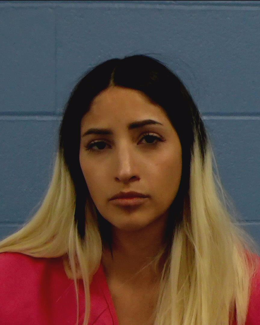 Gomez, Myra booking photo