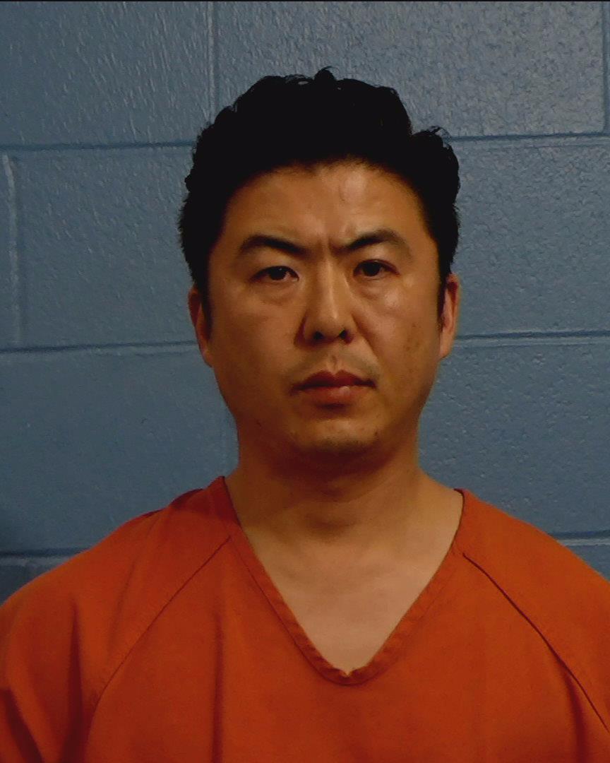 Kim, Il booking photo