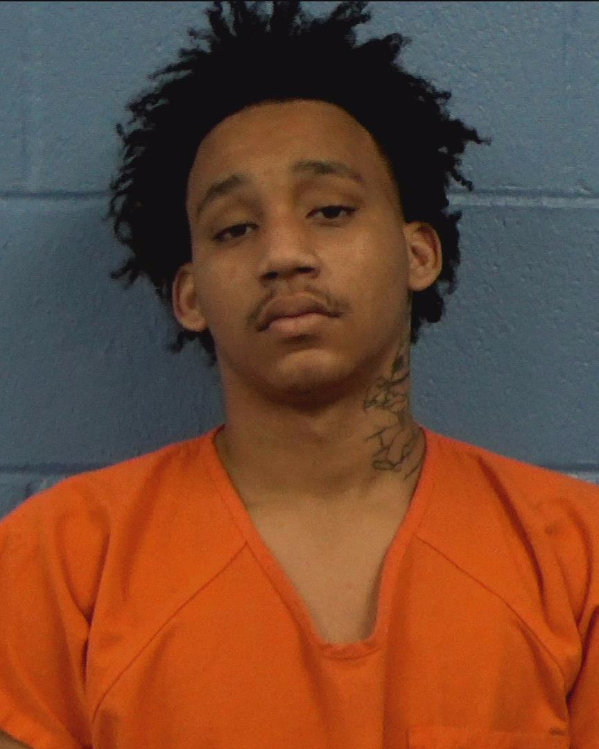 Wells, Travis Devone booking photo