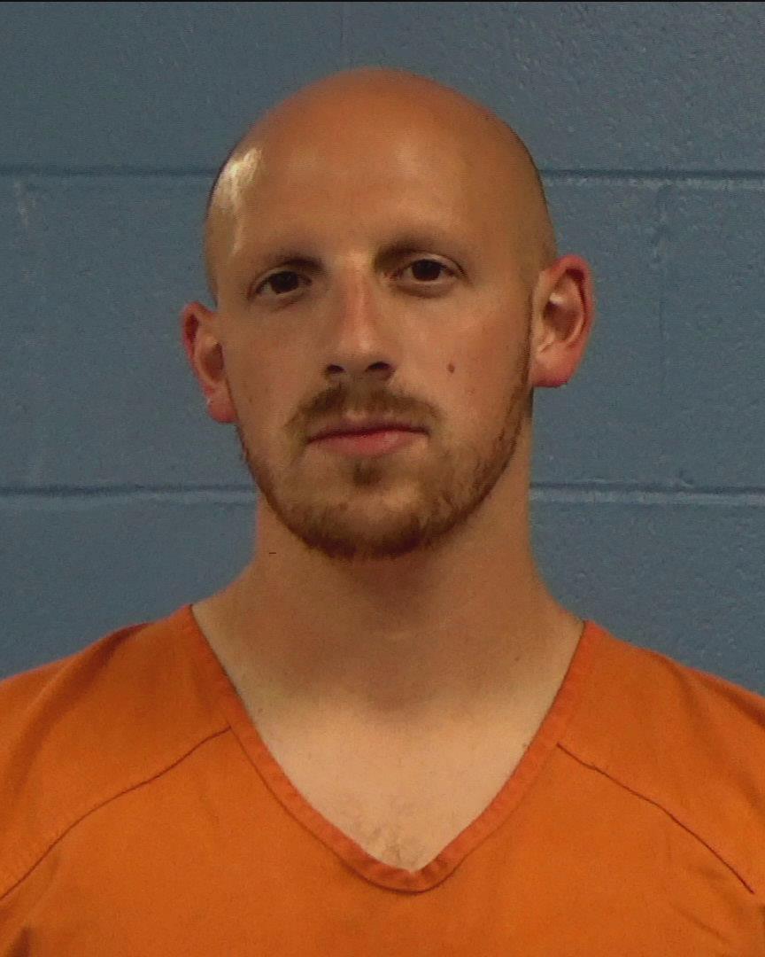 Martinez, Clinton Reed booking photo