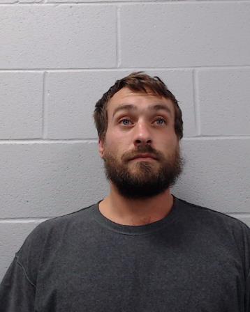 Travis, John Leigh booking photo