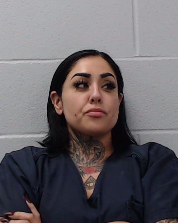 Tennison, Elena Carlin booking photo