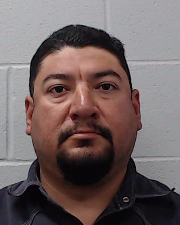 Ortiz-Munoz, George booking photo