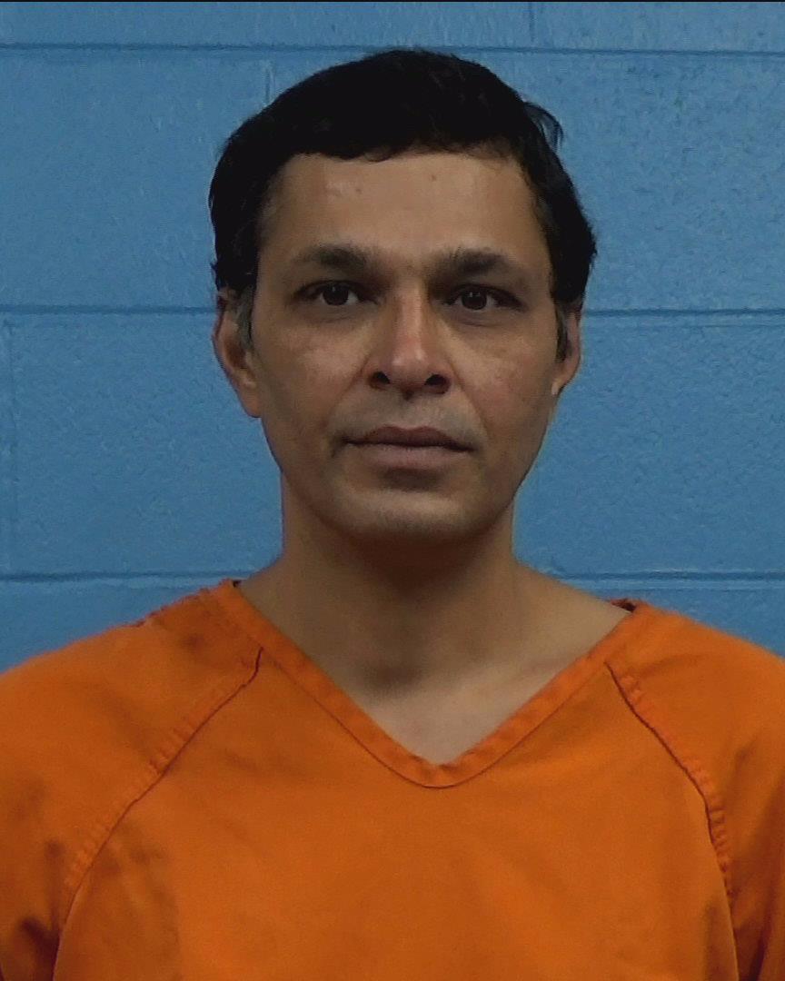 Merchant, Karim booking photo