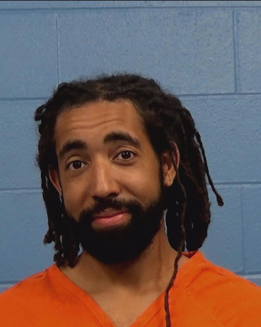 Dennis, Chamberlain booking photo