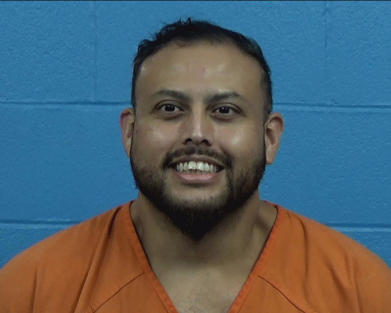 Magallan, Scott Nicholas booking photo