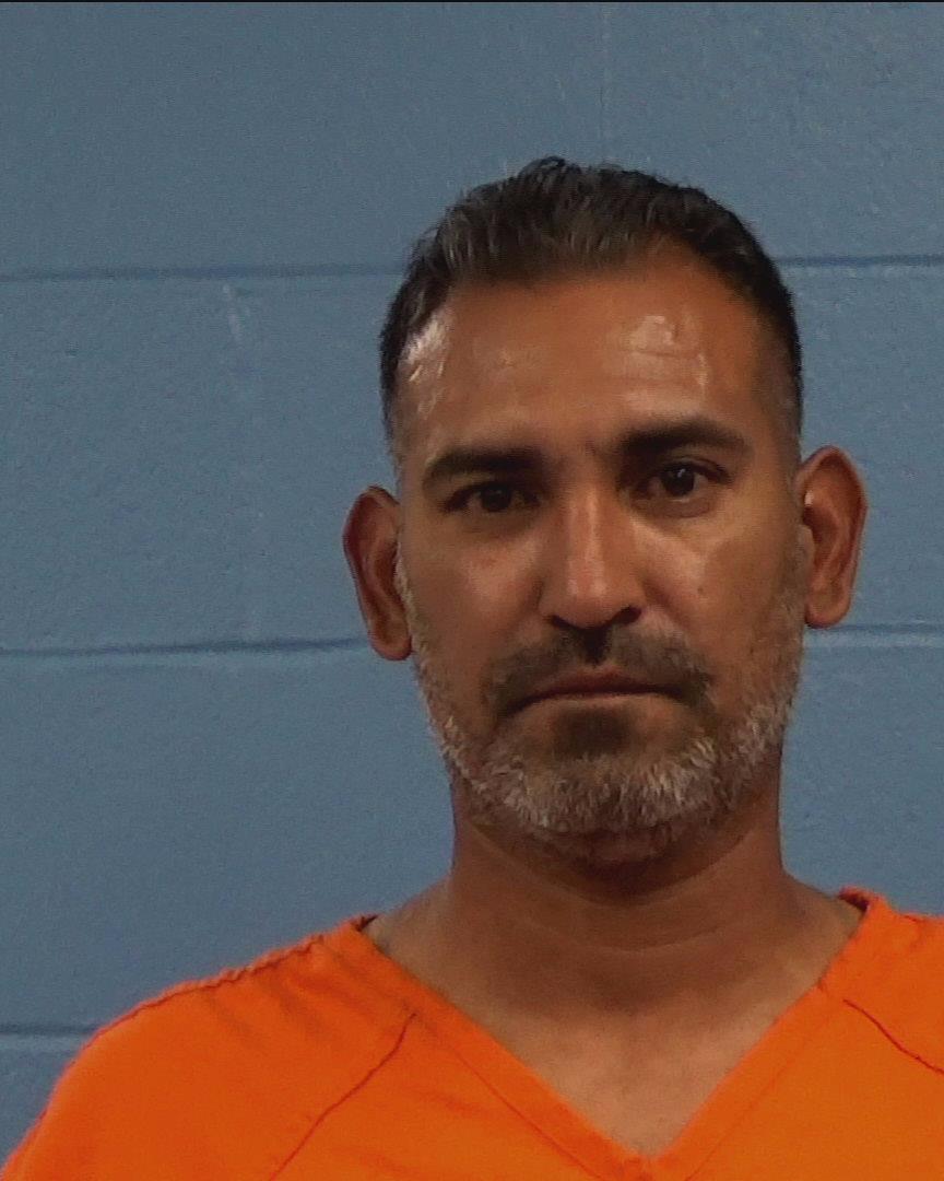 Martinez, Oscar booking photo