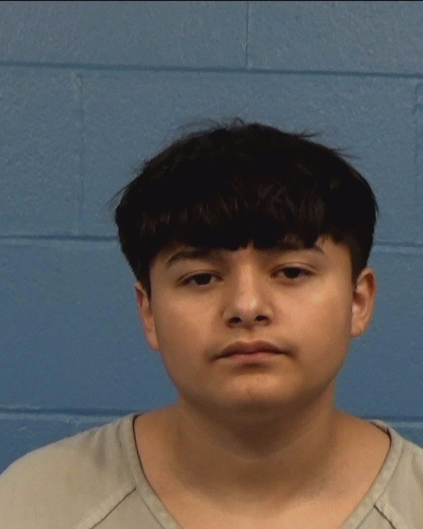 Flores, Nelson Owen booking photo