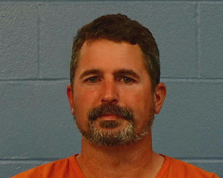 Saxon, Christopher Lee booking photo