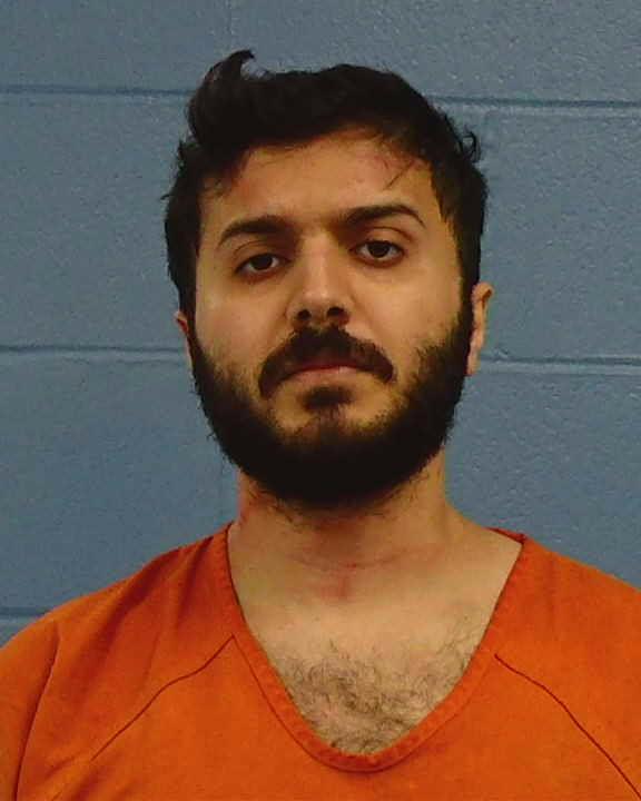 Hussein, Hussein booking photo