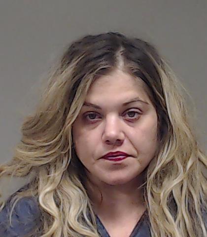 Farhat, Megan Amira booking photo