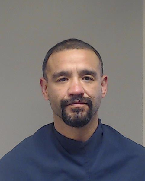 Briones, Adrain Julian booking photo