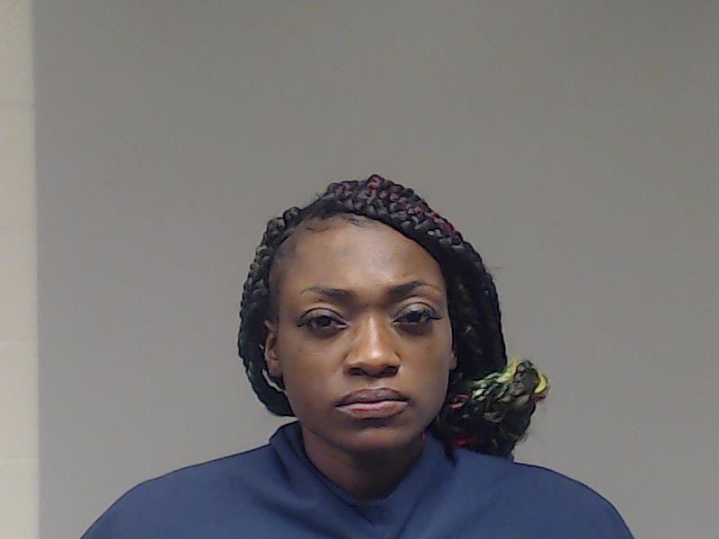 Dennis, Dejanett Tkia booking photo