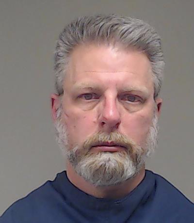 Kirk, Travis Scott booking photo