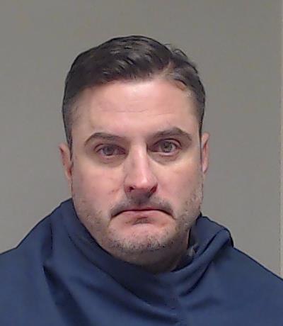 Richards, Andrew Young booking photo