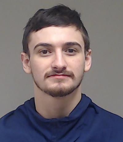 Schmitz, Adam Cole booking photo