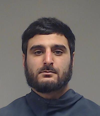 Mirza, Reynus booking photo