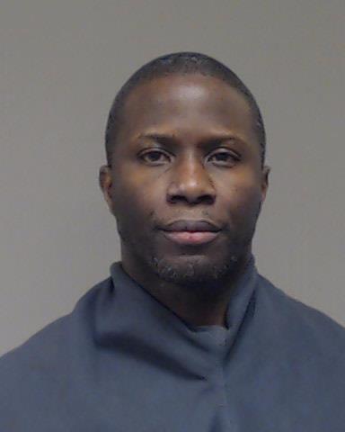 Etuk, Andrew Johnson booking photo