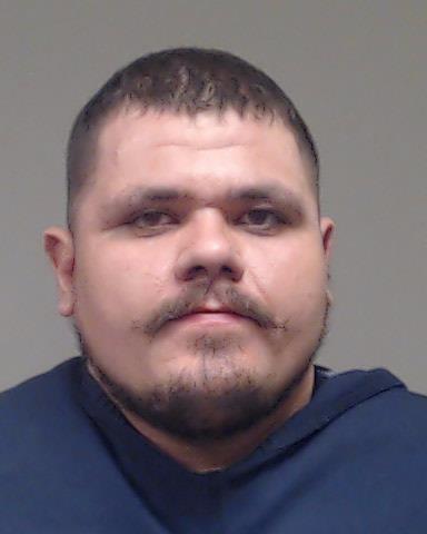 Loman, Brookes booking photo