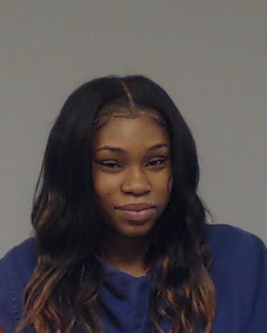 Martin, Mauricia Tenia booking photo