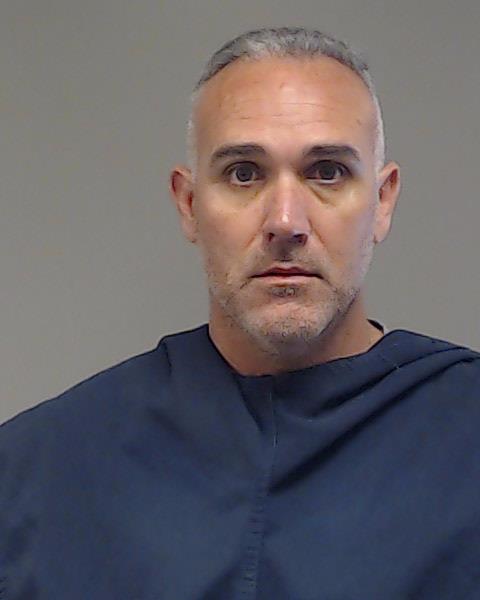 Macdonald, Ryan booking photo