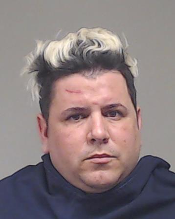 Hernandez, Yamil Moya booking photo