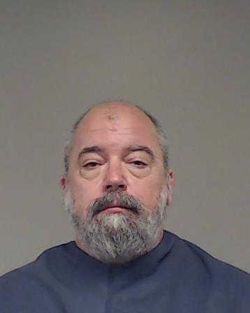 Manas, Michael Todd booking photo