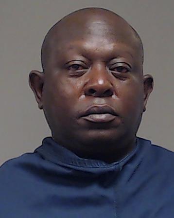 Azande, Boaz Miidu booking photo