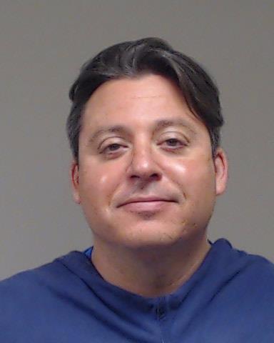 Martinez, Clifton Taylor booking photo