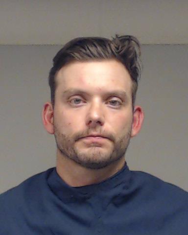 Charles, Jones booking photo