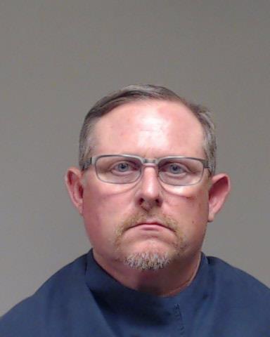 Delgado, James J booking photo