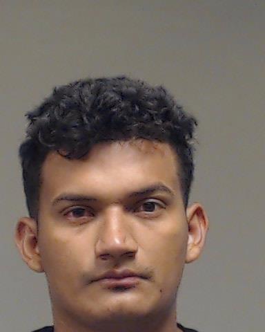 Lagos-Montalvan, Yelston booking photo