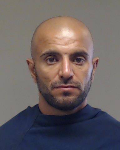 Khalaf, Mushtaq Talib booking photo